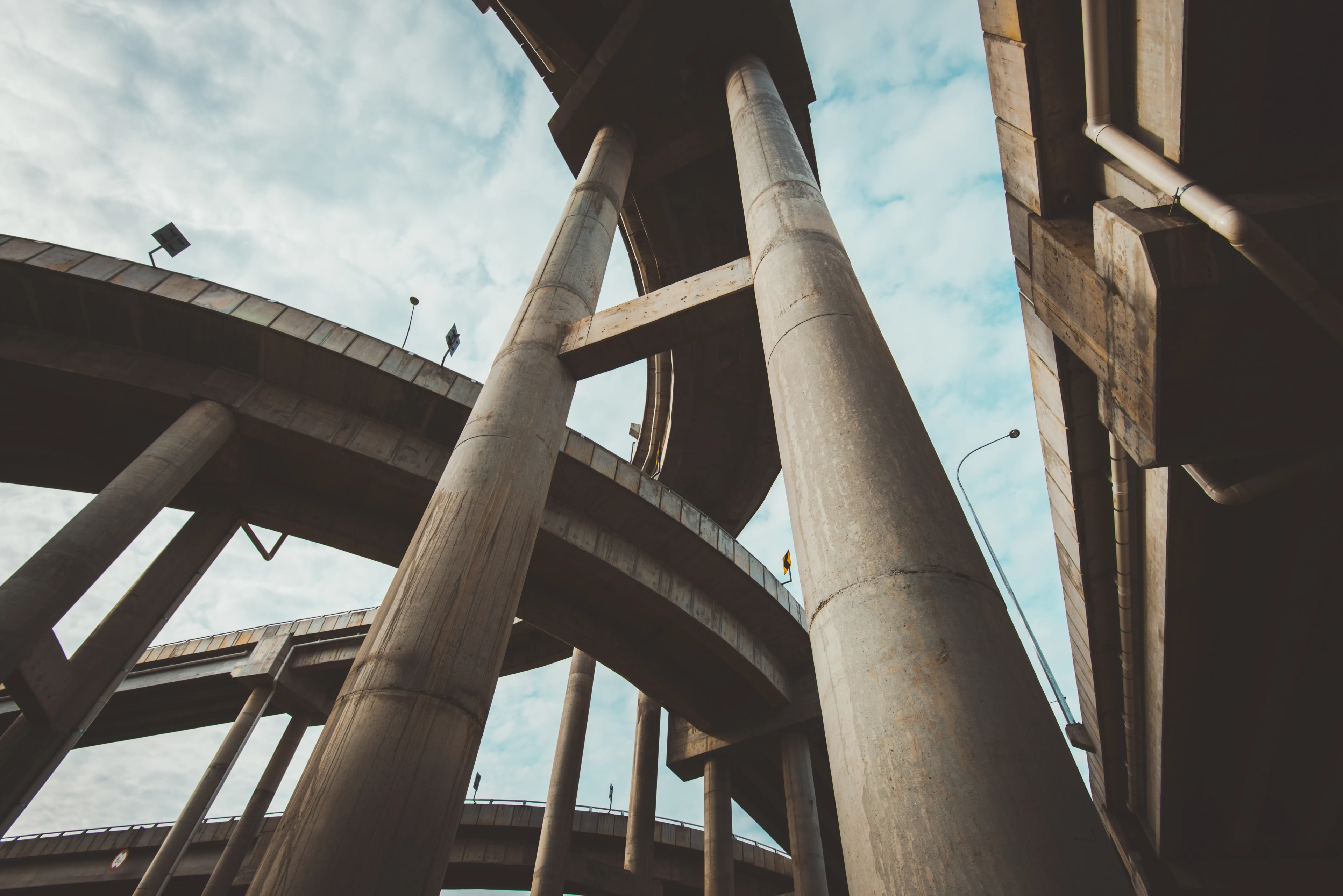 low-angle-view-bridge-against-sky.webp